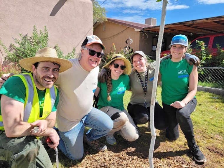 SWCA employees pictured during an Albuquerque, New Mexico tree planting event. 