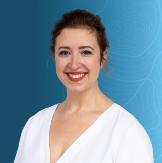 Headshot of Heather Moffitt on a blue topographic background. 